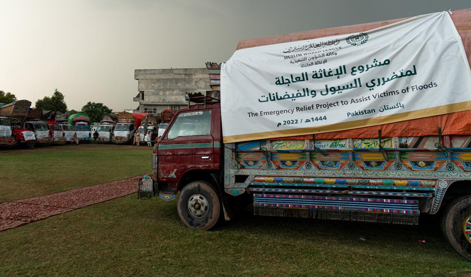 A general view of trucks carrying relief aid by Muslim World League in Islamabad on October 8, 2022. (Photo courtesy: Muslim World League)