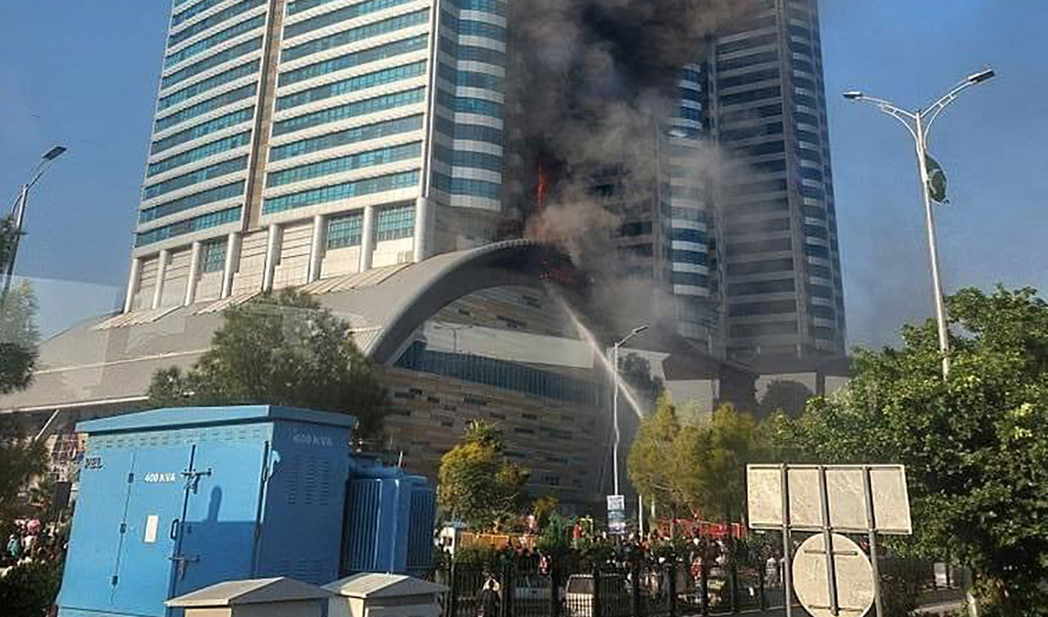 This screengrab taken from a video shows smoke billowing from Centarus Mall in Islamabad on October 9, 2022. (Photo courtesy: social media)