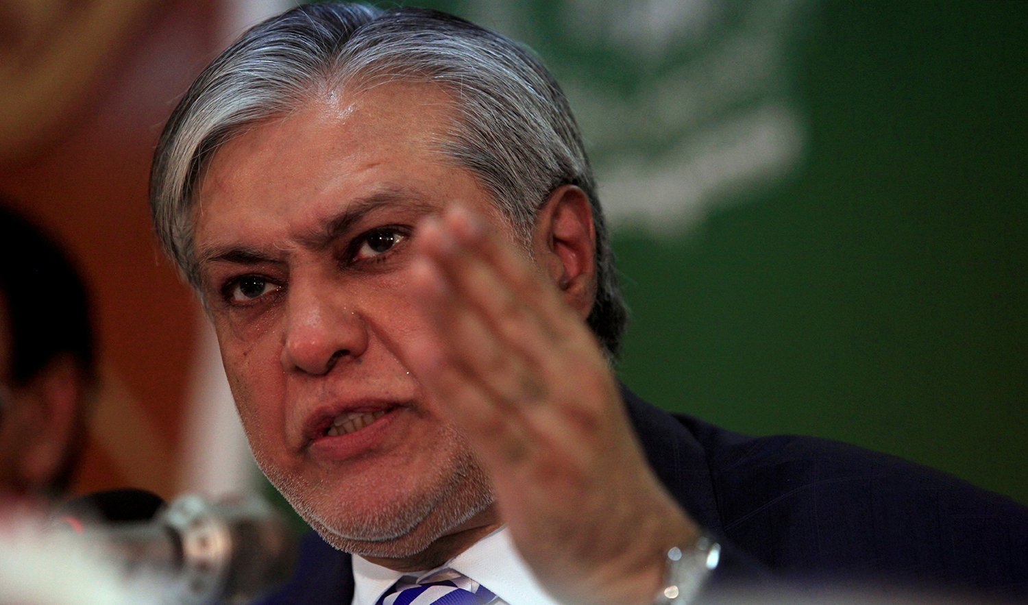 Pakistan's Finance Minister Ishaq Dar gestures during a news conference to announce the economic survey of fiscal year 2016-2017, in Islamabad, Pakistan, May 25, 2017. REUTERS