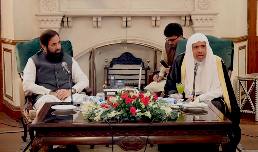 Secretary General of the World Muslim League Dr. Mohammad bin Abdulkarim Al-Issa (R) speaks to the media with Pakistan's Punjab Governor Muhammad Baligh-ur-Rehman in Lahore on October 12, 2022. (Screengrab from video)