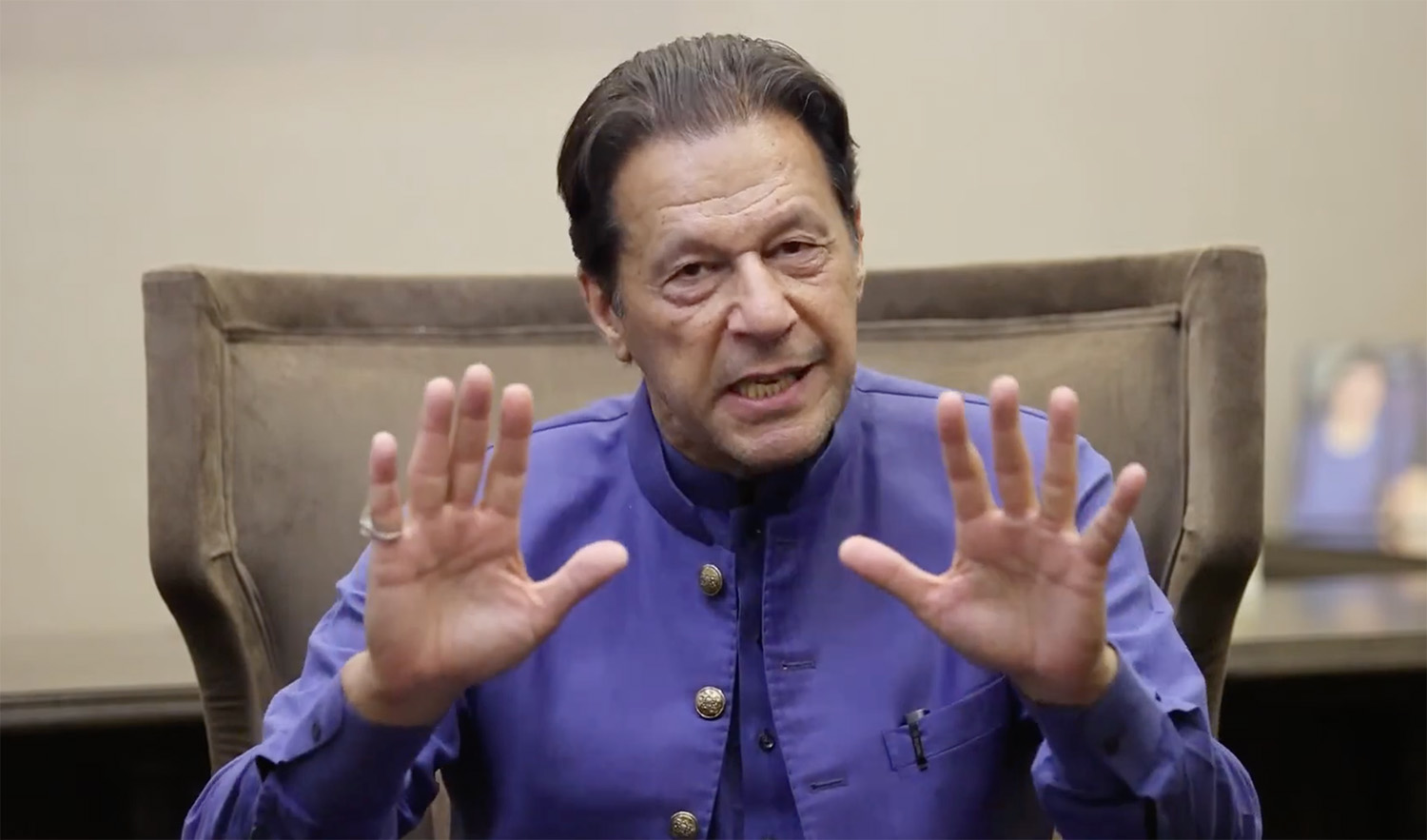 Screen grab taken from a video shared by Pakistan Tehreek-e-Insaf (PTI) party on October 21, 2022, featuring Pakistan's former prime minister Imran Khan. (Photo courtesy: PTI)