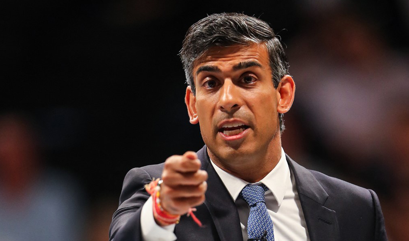 Britain's former Chancellor to the Exchequer Rishi Sunak reacts as he answers questions while taking part in a Conservative Party Hustings event in Birmingham, on August 23, 2022. (AFP/File)