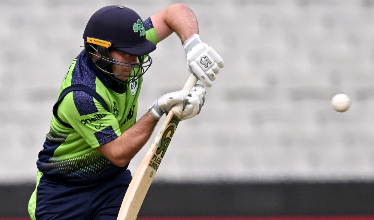 Ireland's Curtis Campher bats during the ICC men's Twenty20 World Cup 2022 cricket match between England and Ireland at Melbourne Cricket Ground (MCG) on October 26, 2022 in Melbourne. (AFP)