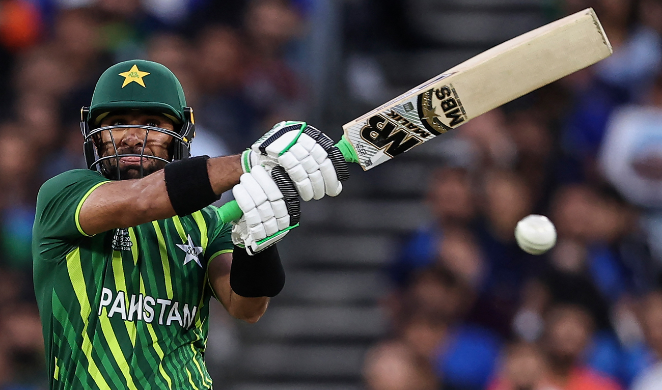 Pakistan's Iftikhar Ahmed plays a pull shot during the ICC men's Twenty20 World Cup 2022 cricket match between India and Pakistan at Melbourne Cricket Ground (MCG) in Melbourne on October 23, 2022. (AFP)