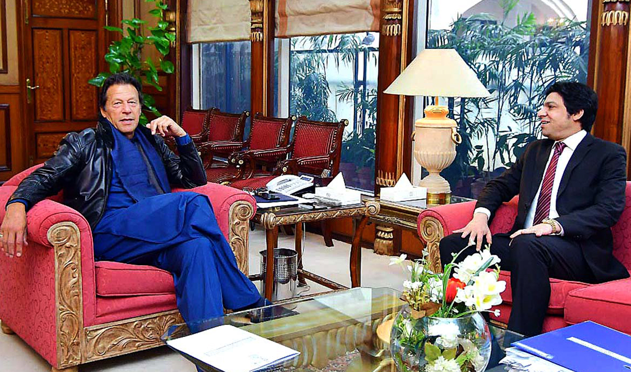 In this file photo, taken on January 10, 2022, Pakistan's former federal minister speaks with then PM Imran Khan at the Prime Minister House in Islamabad. (APP/File)