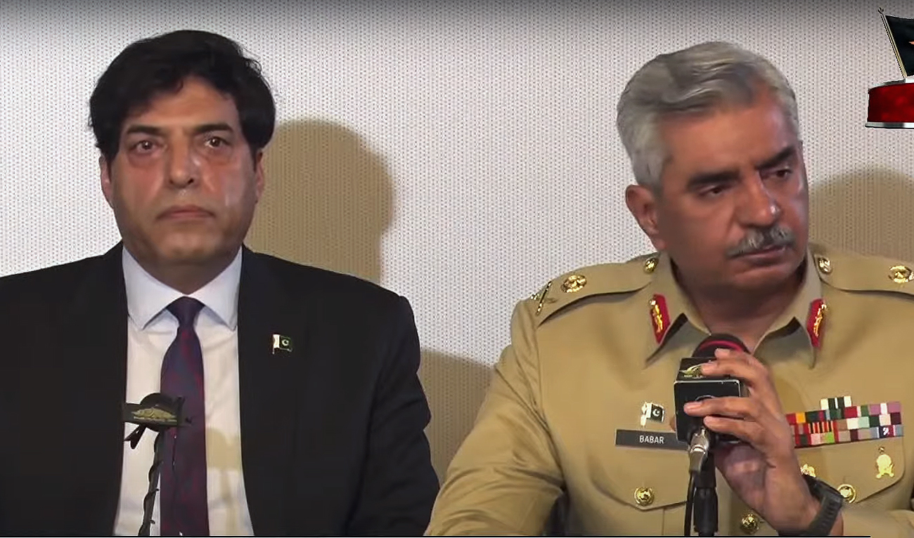 Pakistan military's spokesperson (right), Lt Gen Babar Iftikhar, speaks to the media along with the chief of the country's spy agency (left), Inter-Services Intelligence (ISI), Lieutenant General Nadeem Anjum at a press conference in Rawalpindi on October 27, 2022. (Screengrab/PTV News)