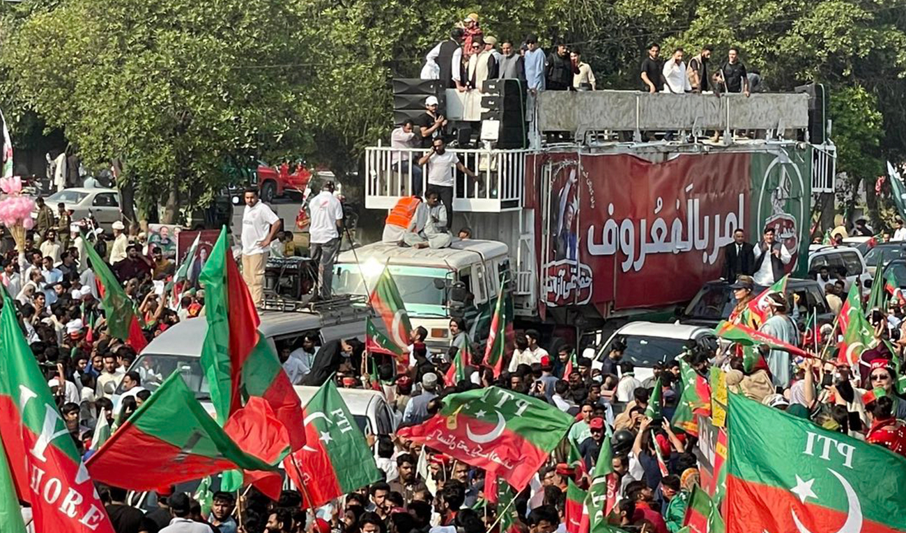 Supporters of Pakistan's former prime minister Imran Khan, take part in a protest rally in Lahore on October 25, 2022. (Photo courtesy: PTI)