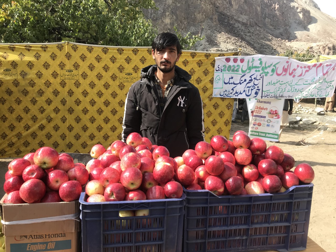 A farmer poses for a photograph at a stall during Suspolo Festival in Kharmang district of Gilgit-Baltistan, Pakistan on October 27, 2022. (AN Photo)
