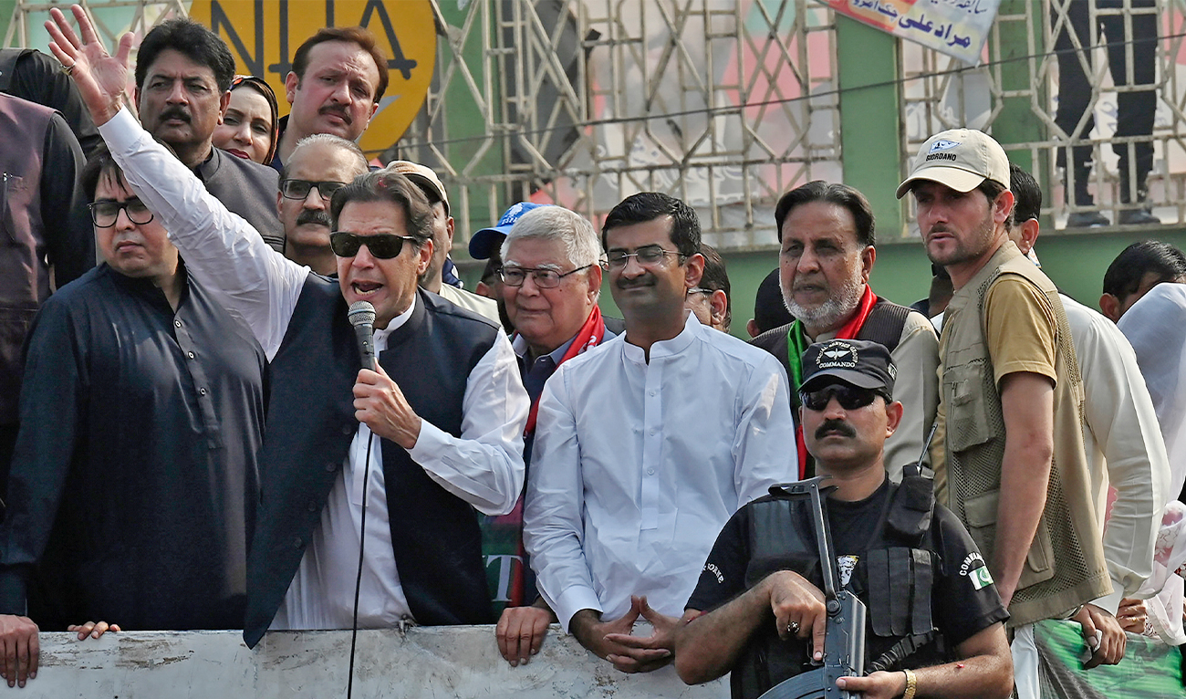 Pakistan's former Prime Minister Imran Khan, second left, addresses to his supporters at a rally in Muridke of Lahore, Pakistan, on October 30 2022. (AP)