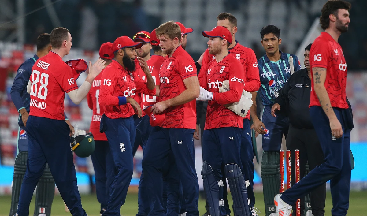 England's players congratulate each other after winning the seventh twenty20 cricket match against Pakistan, in Lahore, Pakistan, on October 2, 2022. (AP)