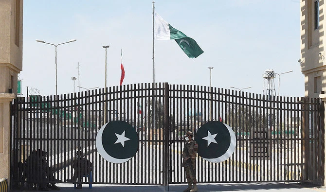 Pakistani soldiers wearing facemasks stand guard at the closed Pakistan-Iran border in Taftan on February 25, 2020. (AFP/File)