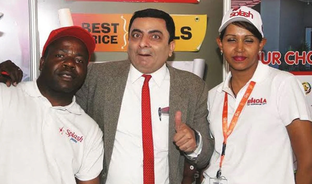 This undated photo shows Pakistani comedian Asif Muhammad, impersonating as television character Mr Bean, with the organizers of his show in Zimbabwe. (Social Media)