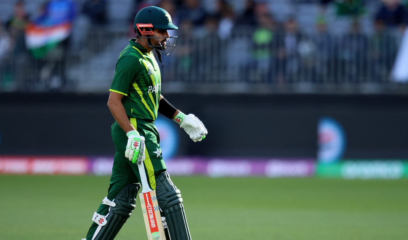 Pakistan's Captain Babar Azam walks off the field after his dismissal during the ICC men's Twenty20 World Cup 2022 cricket match between Pakistan and Netherlands at the Perth Stadium on October 30, 2022 in Perth. (AFP)