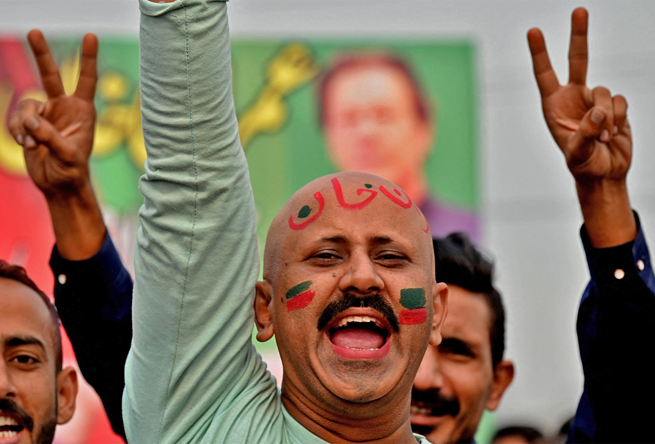 Supporters of Pakistan's former prime minister Imran Khan take part of an anti-government march towards capital Islamabad, demanding early elections, in Gujranwala on November 1, 2022. (AFP)