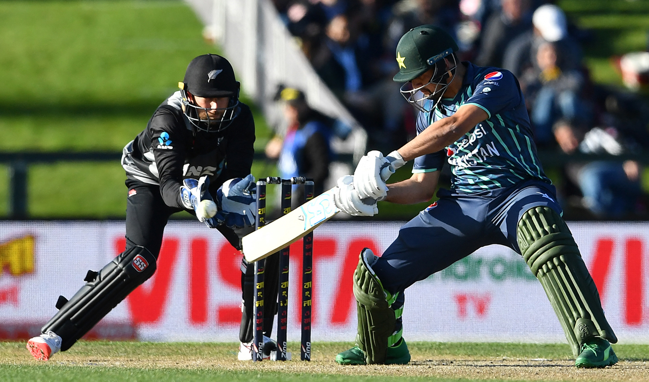 Pakistan's Haider Ali plays a shot in front of New Zealand's wicketkeeper Devon Conway during the Twenty20 tri-series final cricket match between New Zealand and Pakistan at Hagley Oval in Christchurch on October 14, 2022. (AFP/File)