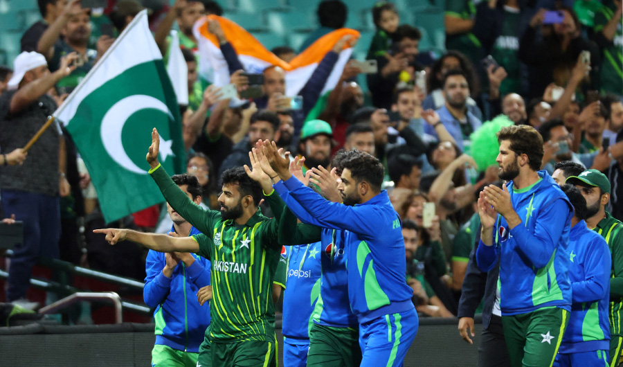 Pakistans cricketers are cheered by supporters as they celebrate after victory in the ICC men's Twenty20 World Cup 2022 semi-final cricket match between New Zealand and Pakistan at the Sydney Cricket Ground in Sydney on November 9, 2022. (AFP)
