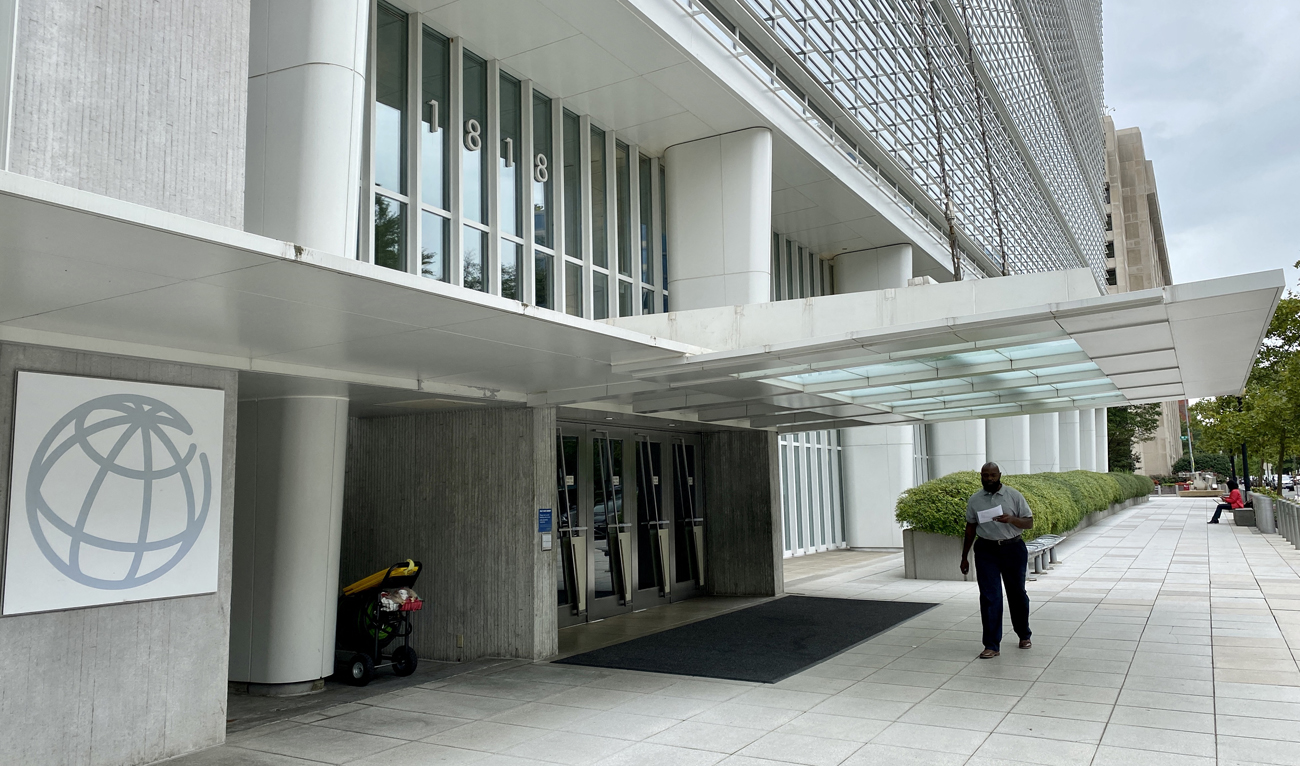 A man is walking in front of the World Bank Building in Washington DC on September 25, 2020. (Photo courtesy: AFP/File)