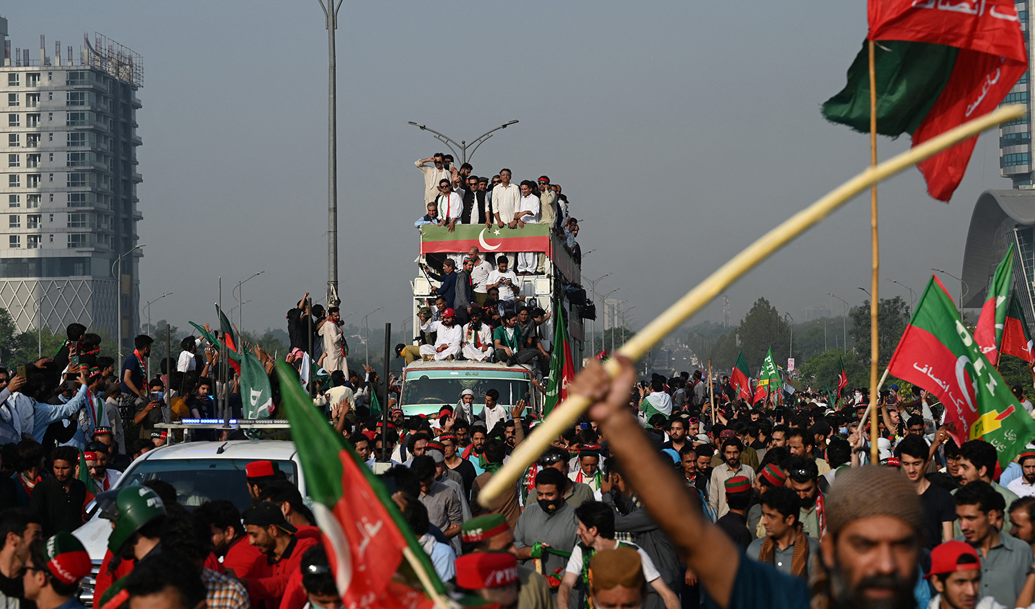 Ousted Pakistan's prime minister Imran Khan (C-top) leads a rally in Islamabad on May 26, 2022. (AFP/File)