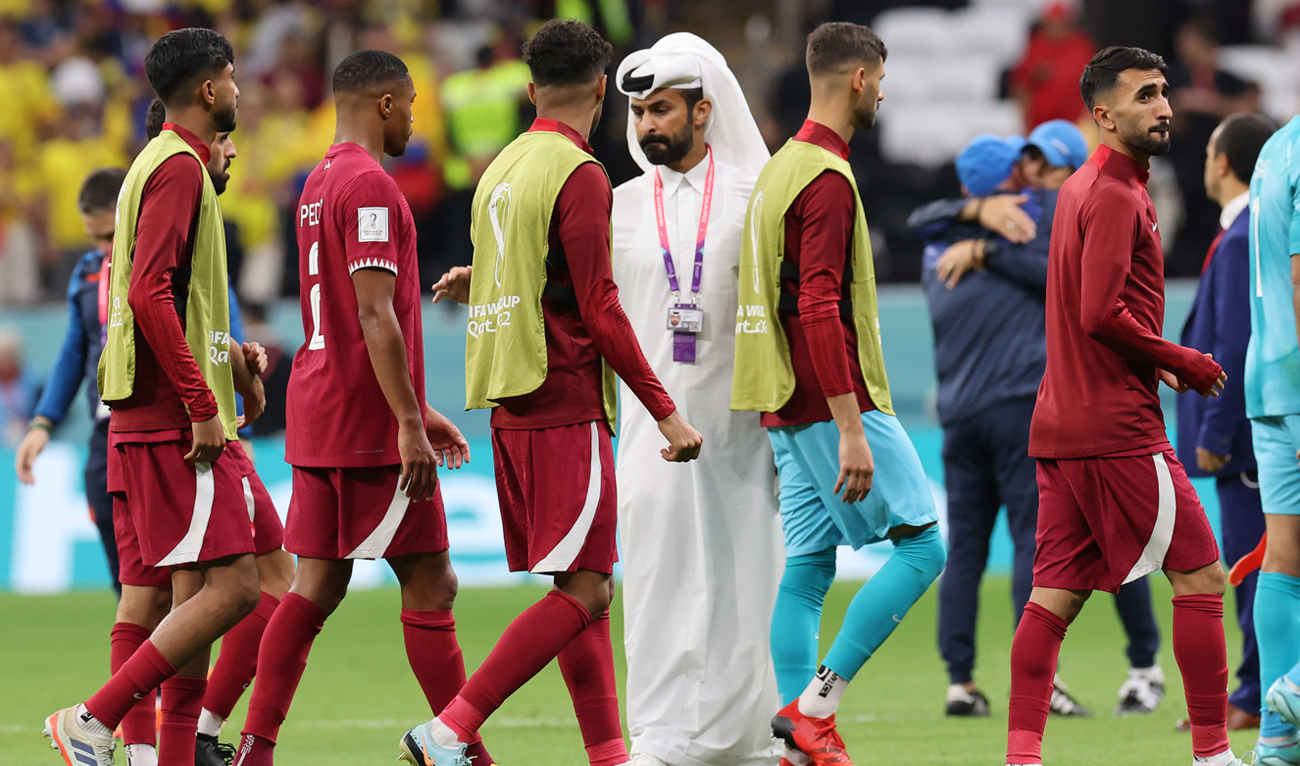 Qatar players leave the pitch after they lost the Qatar 2022 World Cup Group A football match to Ecuador at the Al-Bayt Stadium in Al Khor, north of Doha on November 20, 2022. (Photo courtesy: AFP)