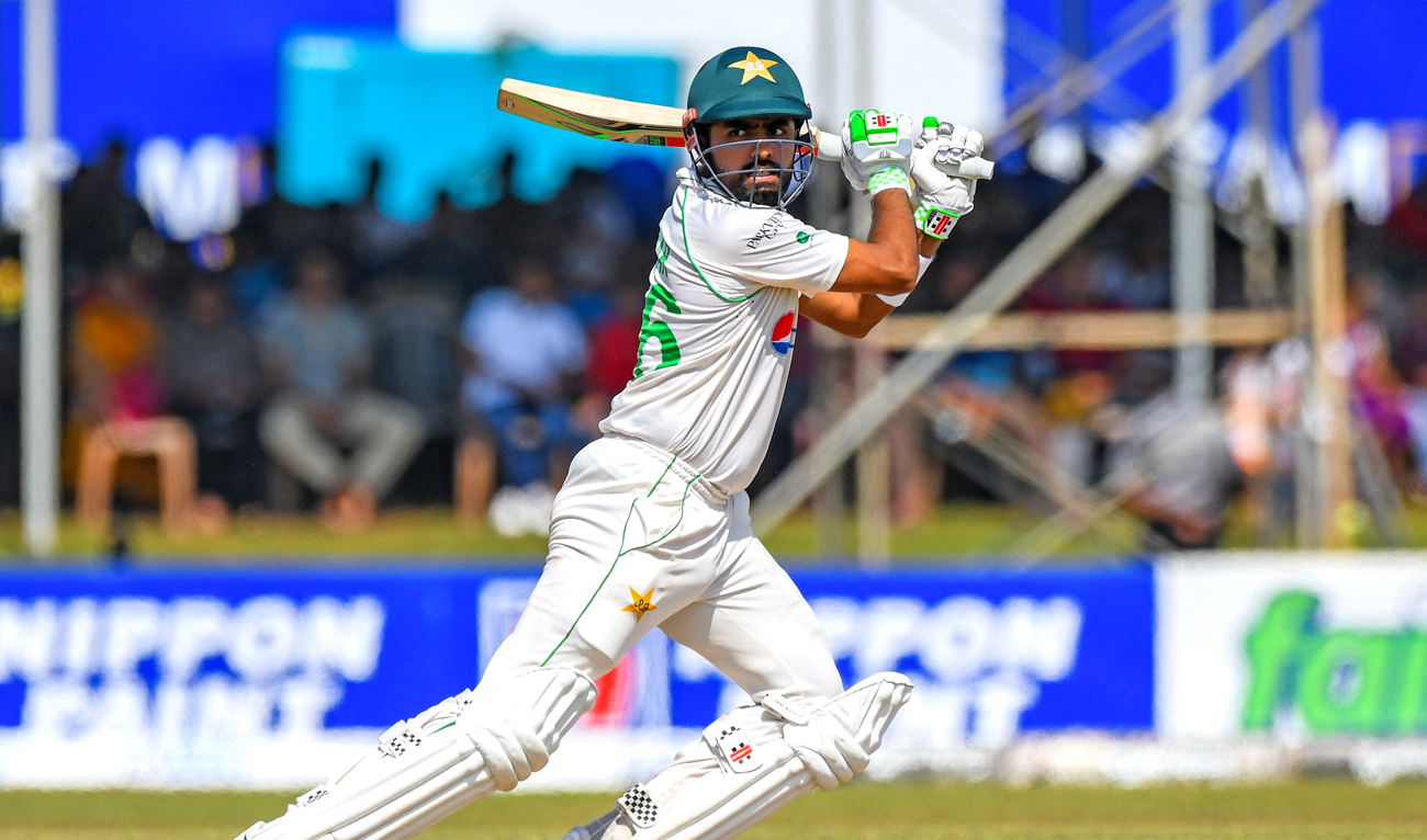 Pakistan’s Babar Azam plays a shot during the fourth day of first cricket Test match between Sri Lanka and Pakistan at the Galle International Cricket Stadium in Galle on July 19, 2022. (Photo courtesy: AFP/File)