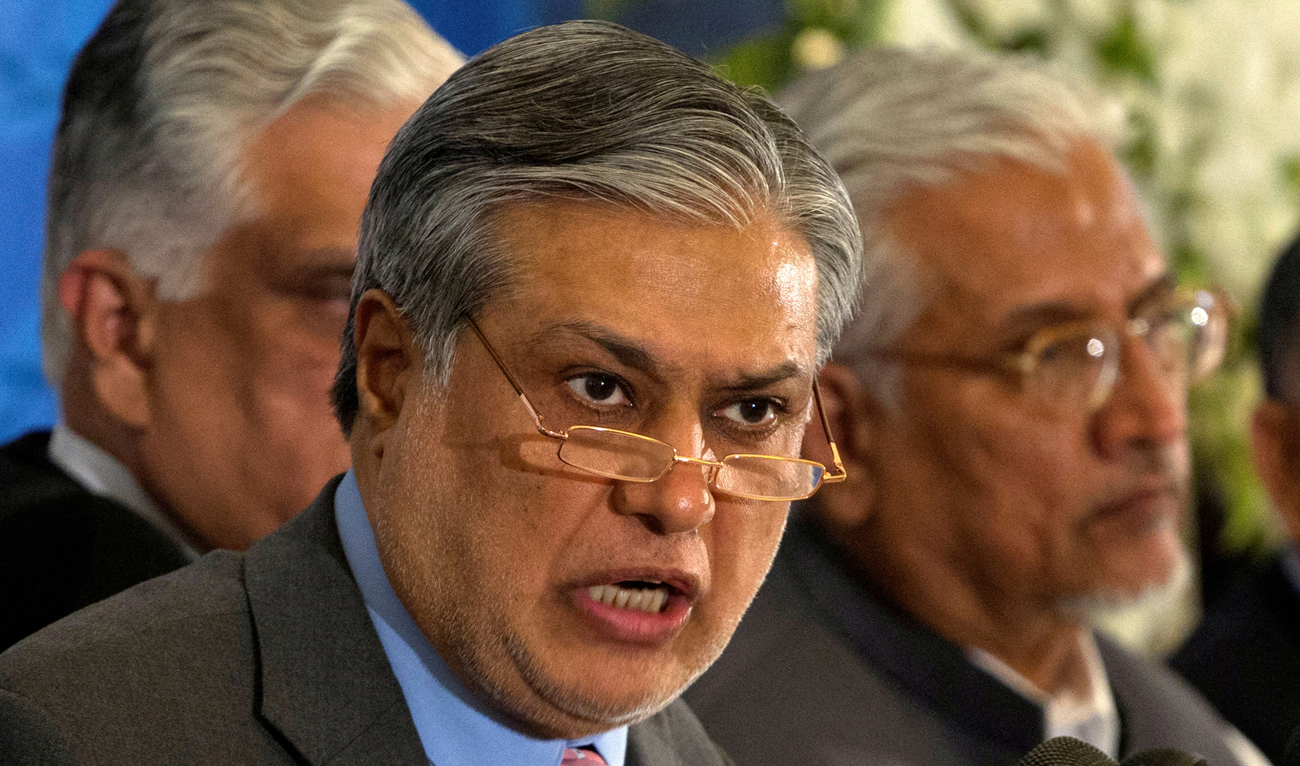 In this file photo, Pakistan's Finance Minister Ishaq Dar announces the result of the first auction for 3G mobile phone networks during a news conference in Islamabad on Apr. 23, 2014. (REUTERS)