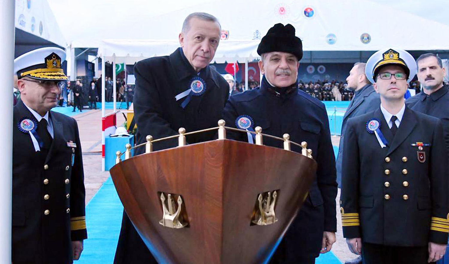 Pakistan Prime Minister Shehbaz Sharif, center right, and Turkish President Recep Tayyip Erdogan, center left, jointly launch PNS Khyber, third of the four MILGEM Corvette ships for Pakistan Navy, in Istanbul, Turkey, on November 25, 2022. (PID)
