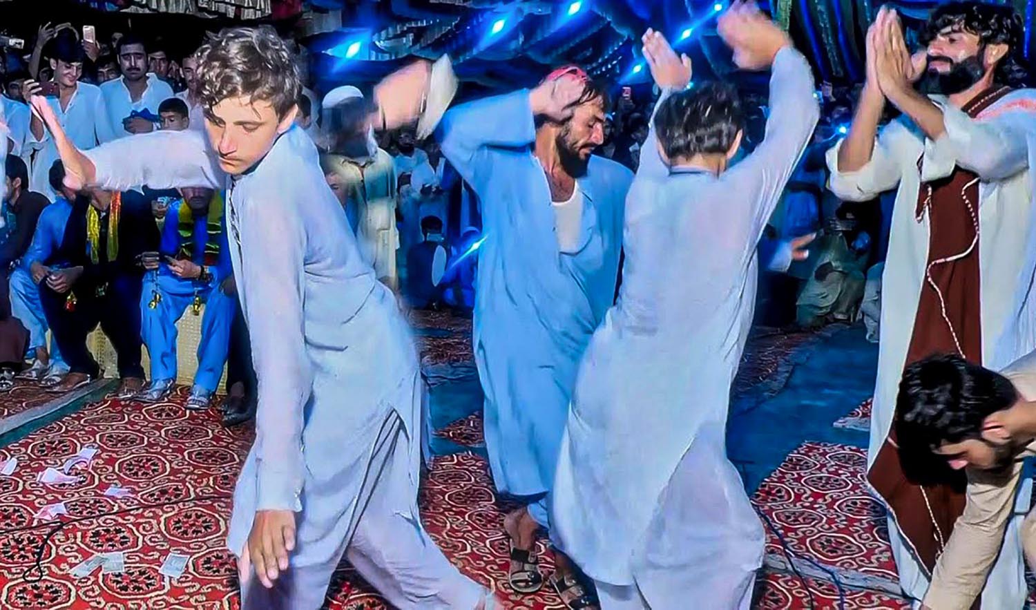 This undated representational photo shows Pakistani men dance at a wedding ceremony in Peshawar. (Photo courtesy: @alazizstudio3227/YouTube)