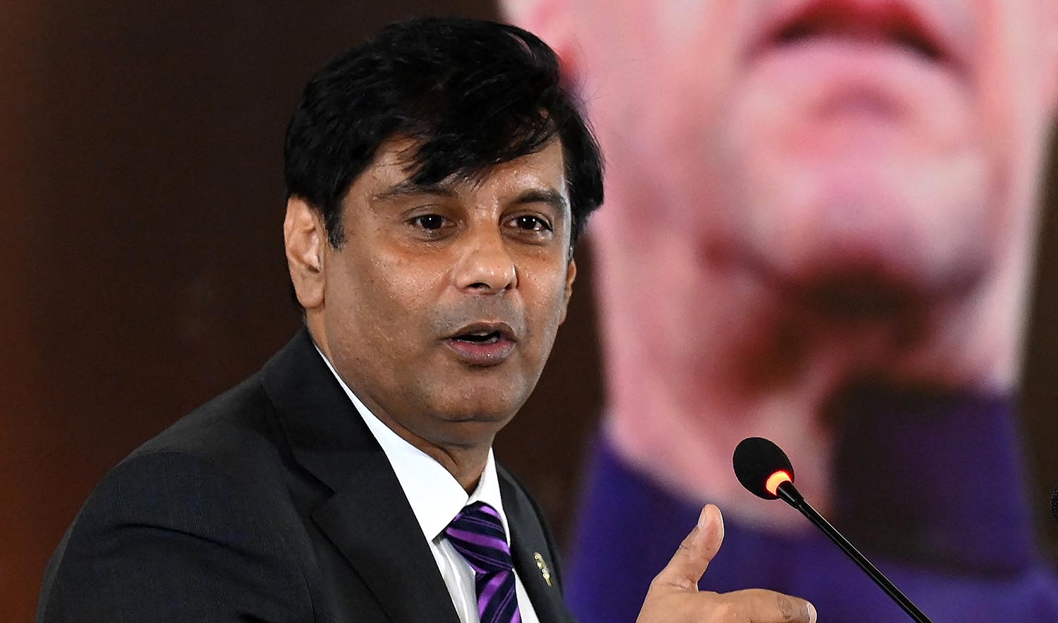 In this picture taken on June 22, 2022, Arshad Sharif speaks during an event on "Regime Change Conspiracy and Pakistan’s Destabilisation" in Islamabad. (AFP/File)
