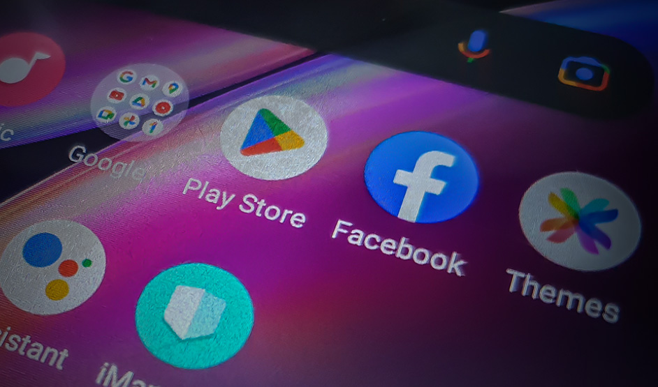 This undated file photo shows a smart phone screen bearing the Google Play Store and Facebook logos. (Photo courtesy: social media)