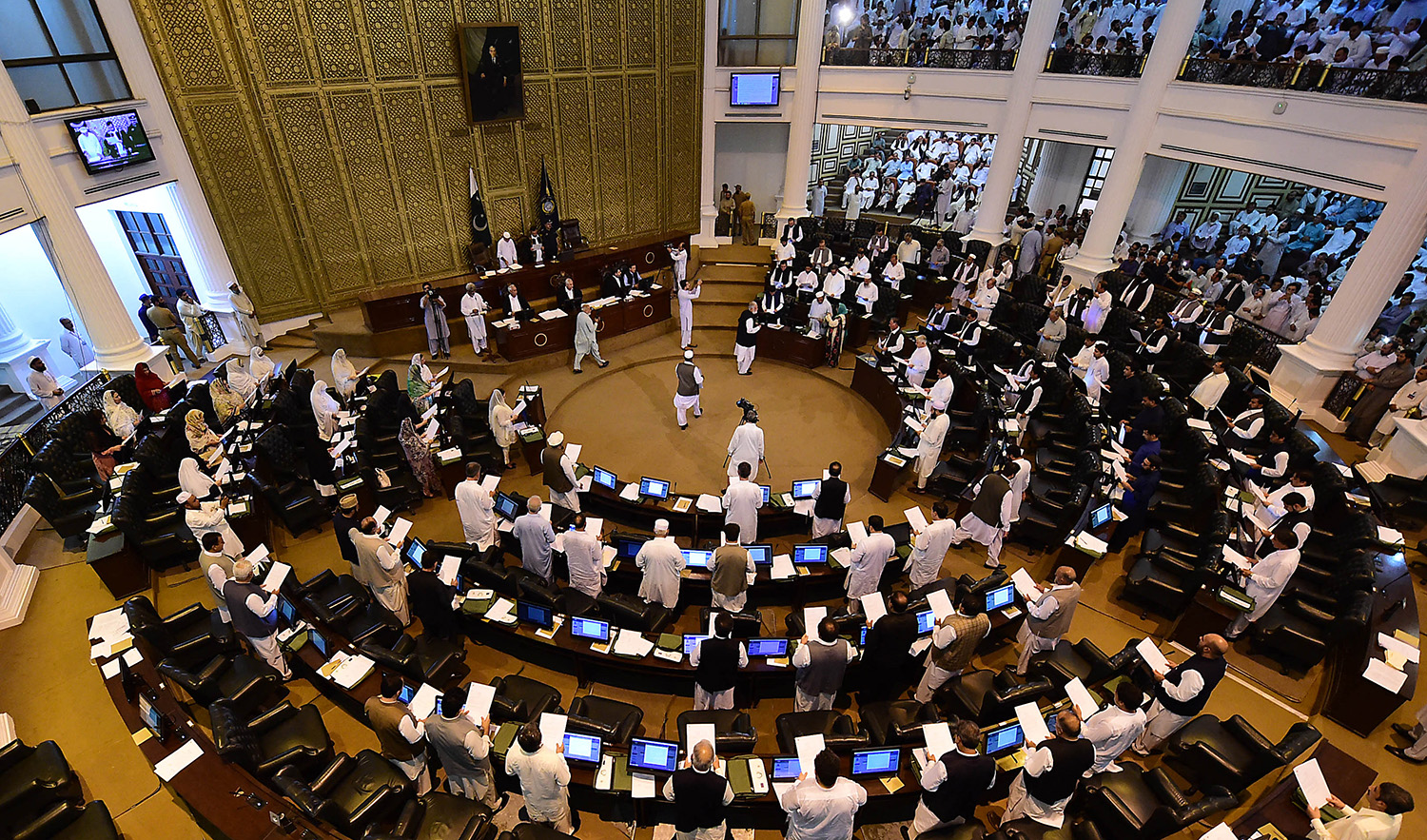 This photograph taken on August 13, 2018 show Pakistani legislators taking oath during a session of the provincial assembly after the July 25 general election, in Peshawar. (AFP/File)