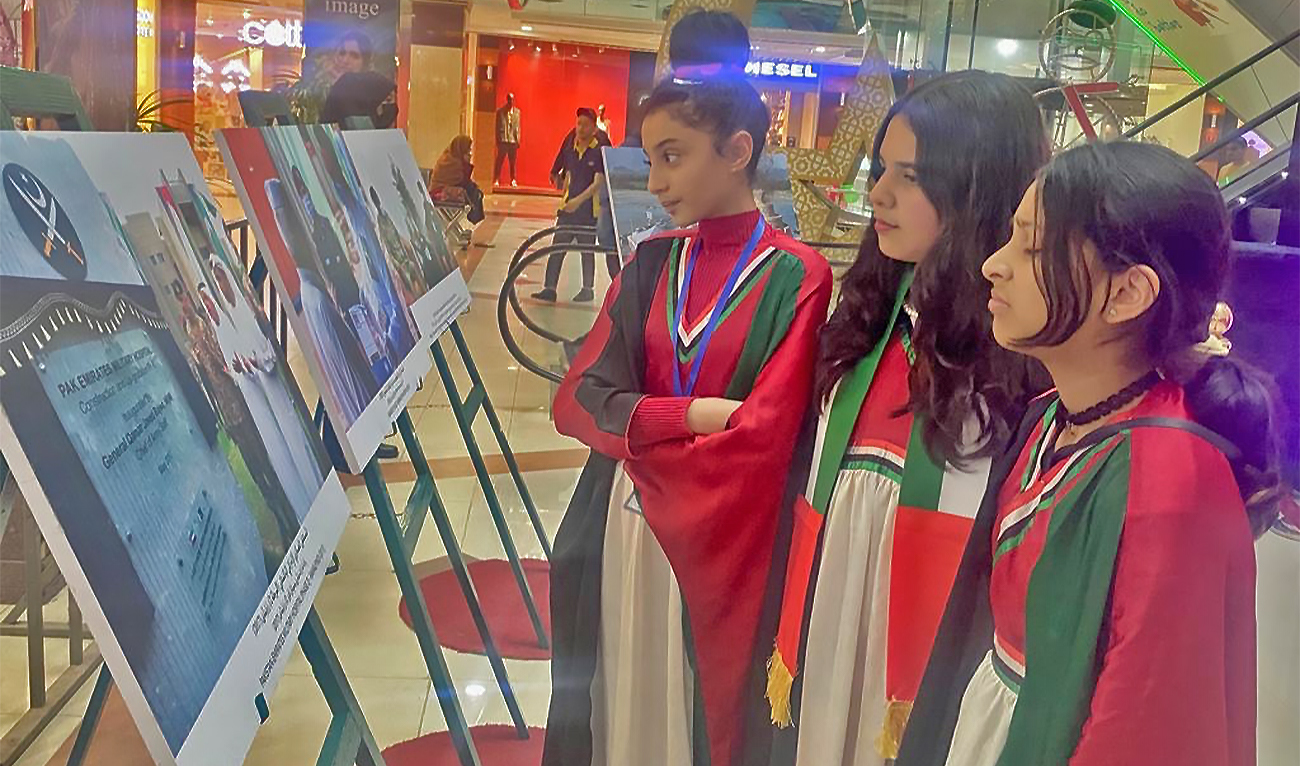 Visitors are viewing photographs at a special exhibition organized in connection with the 51st UAE national day celebrations in Islamabad, Pakistan, on November 30, 2022. (AN Photo)
