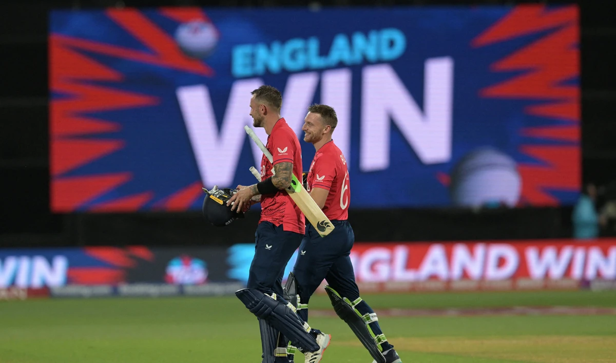 England's Alex Hales (L) and England's Captain Jos Buttler celebrate after victory in the ICC men's Twenty20 World Cup 2022 semi-final cricket match England and India at The Adelaide Oval in Adelaide on November 10, 2022. (AFP)