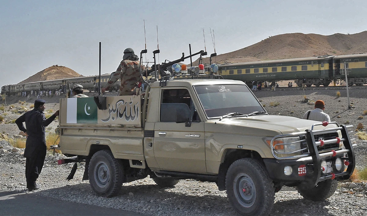 Pakistani soldiers look on near a train in the town of Much, 55 kilometres east of Balochistan's provincial capital Quetta, on October 7, 2016. (AFP/File)
