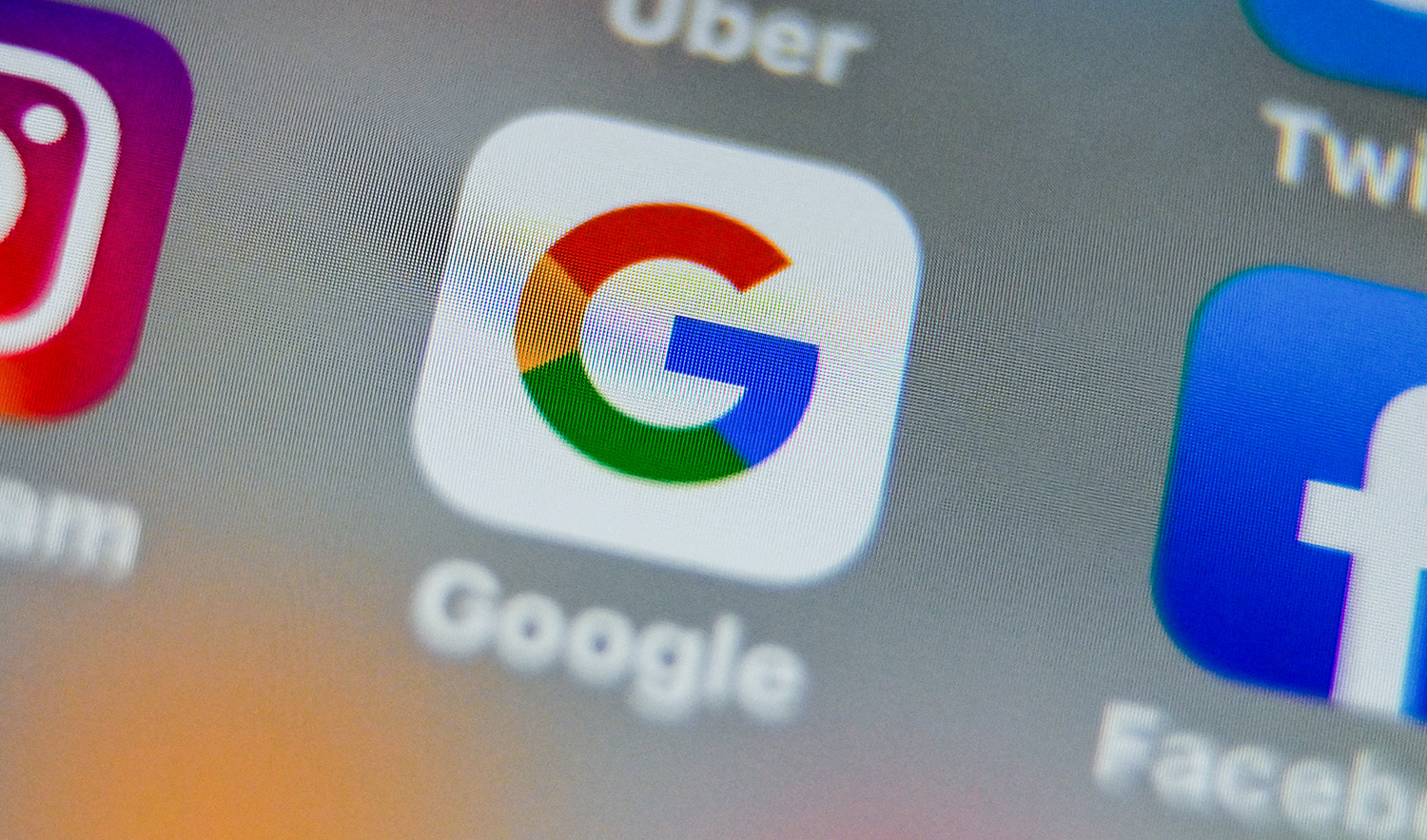 A picture taken on August 28, 2019 shows the US multinational technology and Internet-related services company Google logo application Amazon displayed on a tablet in Lille. (AFP/File)