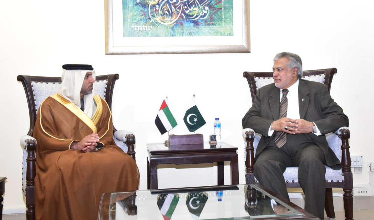 UAE Ambassador Hamad Obaid Al-Zaabi, left, meets Pakistan's finance minister Ishaq Dar at Finance Division in Islamabad on December 1, 2022. (Photo courtesy: @FinMinistryPak/Twitter)