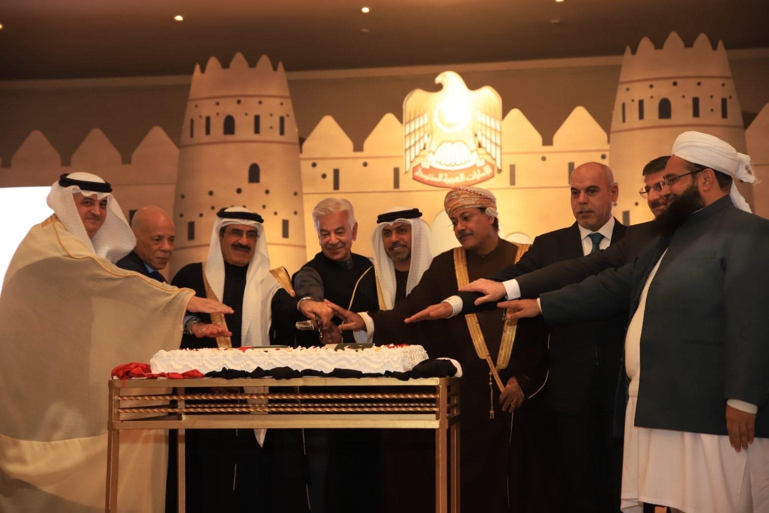 Pakistan’s Defense Minister Khawaja Muhammad Asif participates in the cake cutting ceremony to celebrate the United Arab Emirates's 51st National Day in Islamabad, Pakistan, on December 1, 2022. (AN Photo)