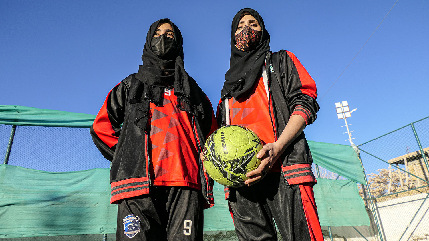 An undated file photo of footballers Rozi Bakht, right, and Mansoora Kakar. (AN photo)