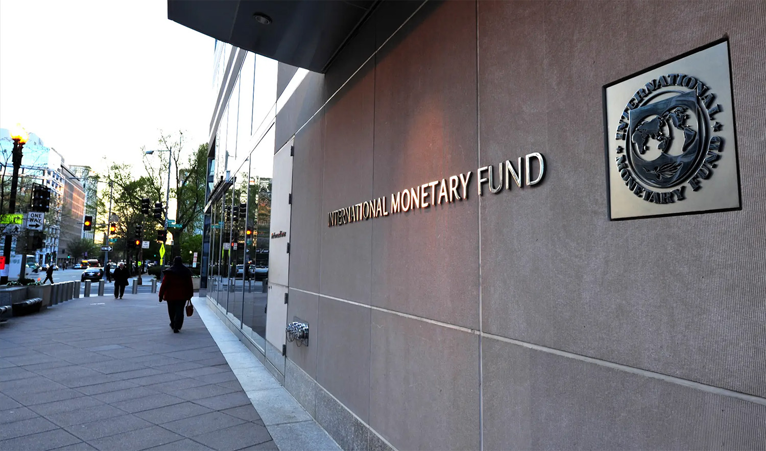 In this file photo, the International Monetary Fund (IMF) logo is seen outside its headquarters in Washington DC, US on April 5, 2016. (AFP)