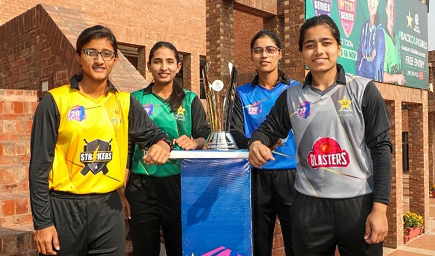 This undated file photo shows captains of teams taking part in Pakistan T20 Women's Cricket Tournament posing with the winning trophy. (Photo courtesy: Pakistan Cricket Board)