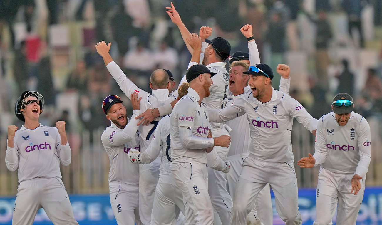 England's players celebrate after winning the first test cricket match against Pakistan, in Rawalpindi, Pakistan, on December 5, 2022. (AP)