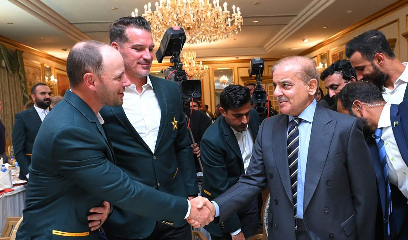 Pakistan Prime Minister Shehbaz Sharif shakes hands with England's cricket squad during a dinner reception at Prime Minister's House in Islamabad on December 5, 2022. (Photo courtesy: Twitter/PakPMO)