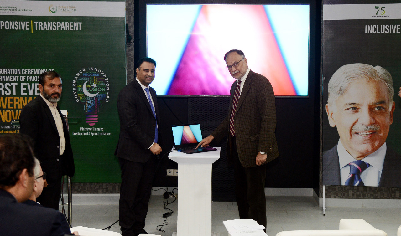 Pakistan's planning minister Ahsan Iqbal, center right, and senior Planning Commission official Dr. Adnan Rafiq, center left, inaugurate "Governance Innovation Lab" in Islamabad on December 9, 2022. (Photo courtesy: @PlanComPakistan/Twitter)