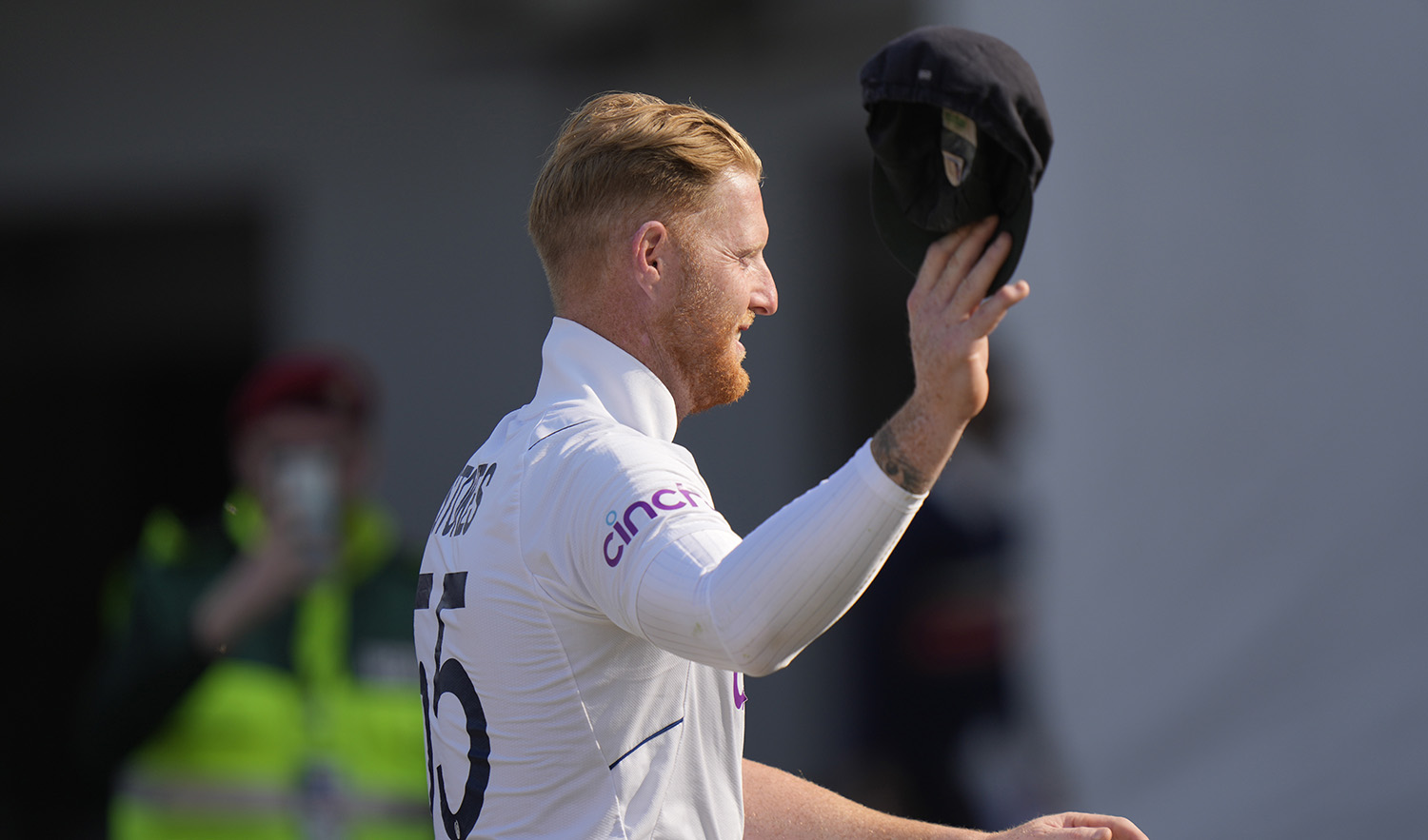 England's skipper Ben Stokes is acknowledged by crowd as he walks off the field after winning the second test cricket match against Pakistan, in Multan, Pakistan, on December 12, 2022. (AP)