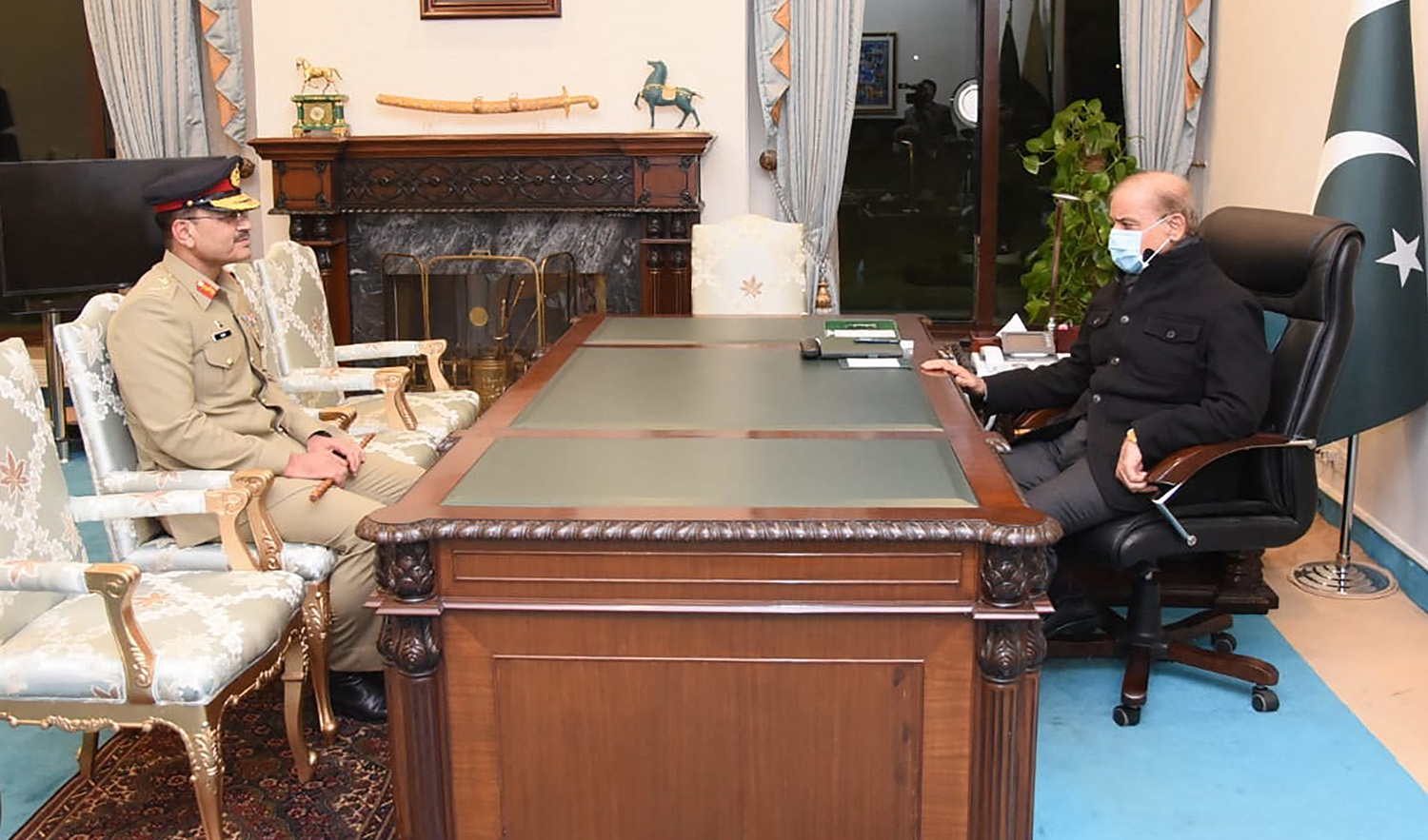 Pakistan's Prime Minister Shehbaz Sharif, right, meets army chief General Syed Asim Munir at the Prime Minister House in Islamabad. (AFP/File)
