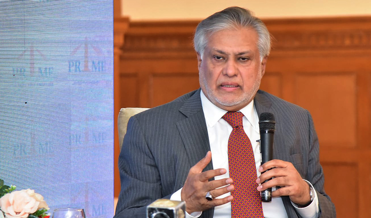 Pakistan's finance minister Ishaq Dar gestures during a seminar in Islamabad on December 14, 2022. (Photo courtesy: Twitter/FinMinistryPak)
