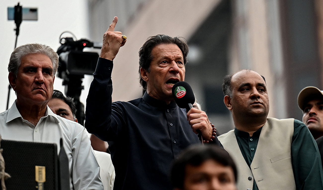 In this picture taken on November 1, 2022, Pakistan's former prime minister Imran Khan (C) addresses his supporters during an anti-government march in Gujranwala. (Photo courtesy: AFP/File)