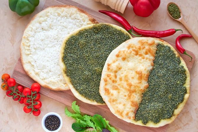 Manakeesh is a type of soft dough that is topped with thyme, cheese or ground meat. Similarly to a pizza, it can be sliced or folded. (Shutterstock)
