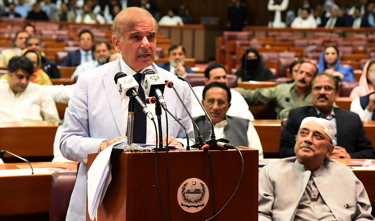 This handout photograph released by the Press Information Department (PID) on April 11, 2022 shows Pakistan's Prime Minister Shehbaz Sharif addressing the National Assembly in Islamabad. (Photo courtesy: AFP/File)