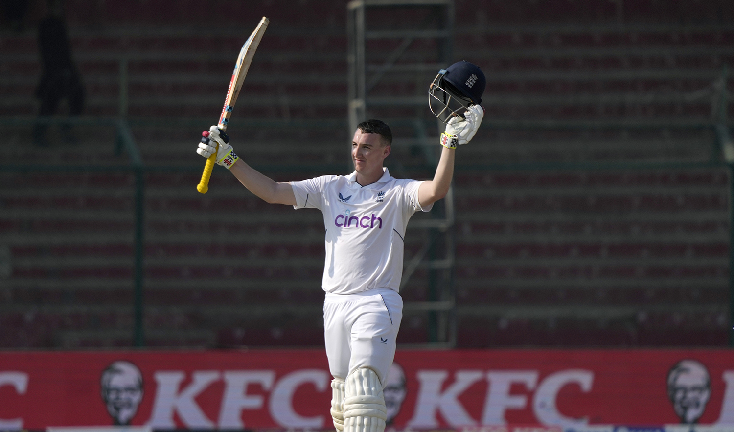 England's Harry Brook celebrates after scoring century during the second day of third test cricket match between England and Pakistan, in Karachi, Pakistan, on December 18, 2022. (AP)