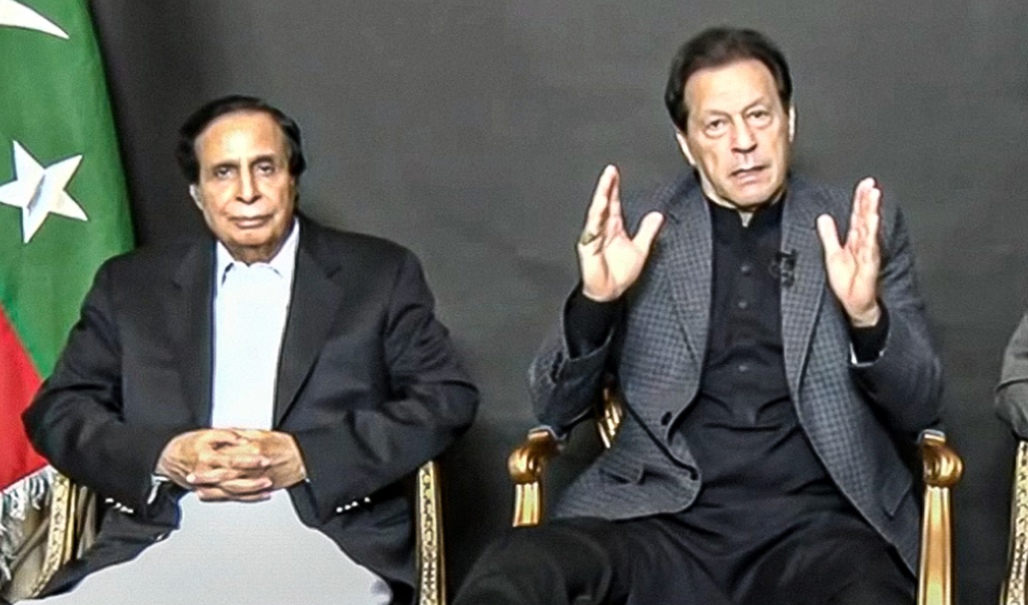 Former Pakistan Prime Minister Imran Khan, right, along with Punjab Chief Minister Pervaiz Elahi, addresses his supporters in Lahore through video link on December 17, 2022. (Photo courtesy: Pakistan Tehreek-e-Insaf)